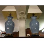 A pair of Chinese blue crackle glaze table lamps and shades.