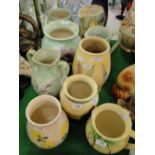 Various Radford jugs and vases.