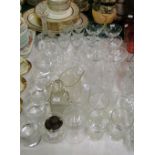 Sets of crystal drinking glasses, 2 cut-glass decanters, etc.