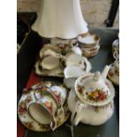 Royal Albert "Old Country Roses" tea service with teapot and matching table lamp.