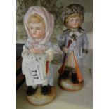 A pair of continental porcelain figures.