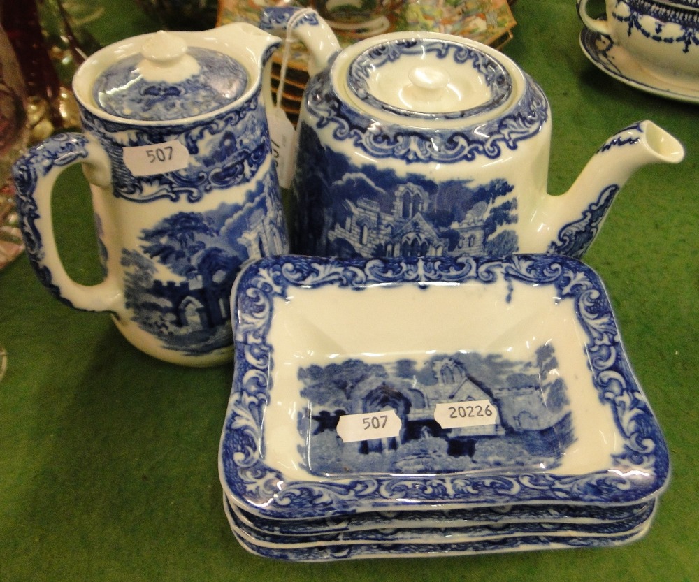 George Jones "Abbey" teapot, hot water jug and shredded wheat bowls.