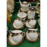 An Aynsley tea service including teapot and hot water jug.