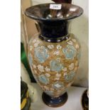 A Doulton baluster vase with floral decoration.