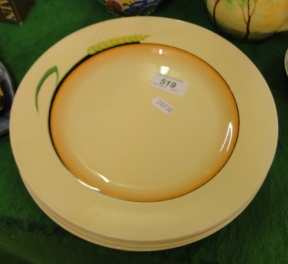 A set of 4 Clarice Cliff "Bizarre" dinner plates with wheat ear design.