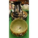 A jardiniere, a Bretby wash jug and basin set with chamber pot with painted floral decoration.