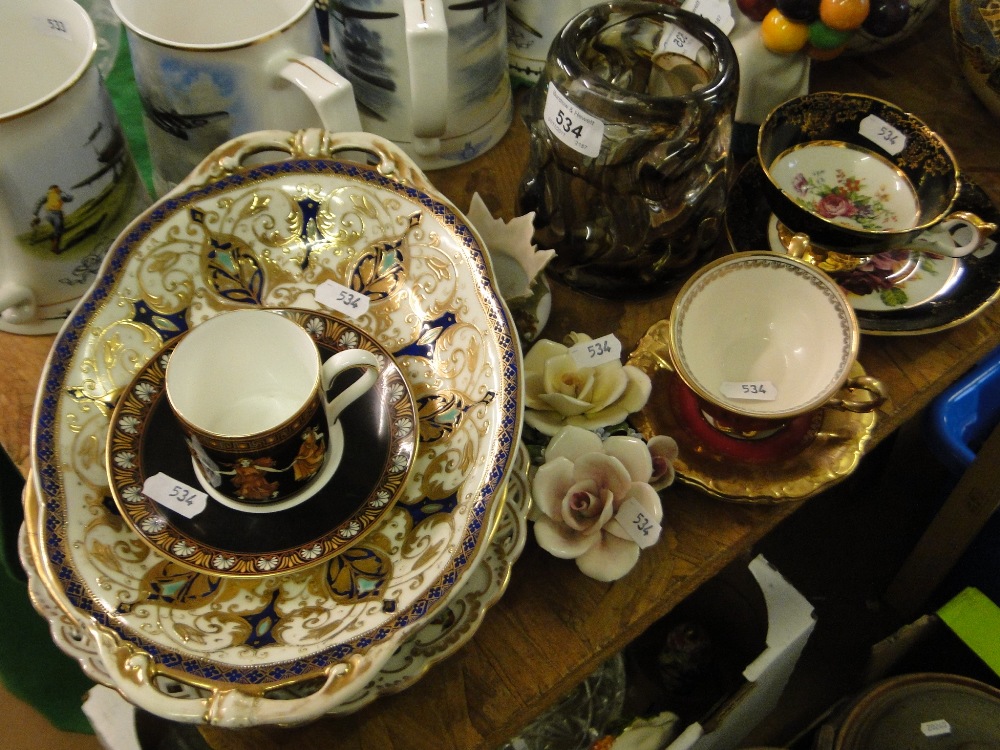 A Whitefriars knobbly glass vase, comport and cabinet cups and saucers.