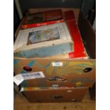 2 Boxes of Vintage jigsaw puzzles.