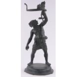 A 19th century patinated bronze sculpture of Silenius holding a serpent aloft, unsigned,