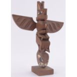 A British Colombia Native Canadian carved and painted cedar wood miniature totem pole,