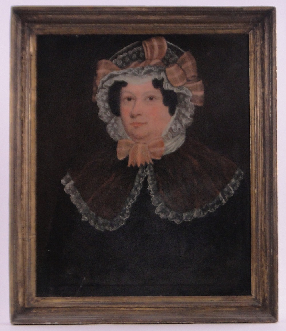 19th century English School, oil on canvas, portrait of a woman wearing a bonnet, unsigned,