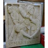 A 3D plaster panel titled "St.