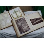 A leather-bound illustrated empty Victorian photograph album and a scrap album