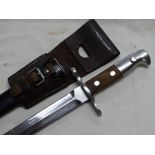 A Swiss bayonet in leather scabbard