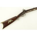 An Antique American double barrel percussion rifle, barrel length 79cm, brass mounted walnut stock.