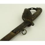 A Victorian Navy Officer's dress sword, etched blade with shagreen and brass hilt,