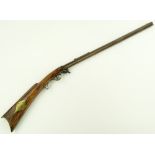 A rare American under hammer percussion rifle, brass mounted walnut stock, barrel length 76cm.