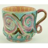 A Fulham Pottery mug, hand painted geometric decoration by Vicky Walton,
