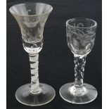 An Antique thistle shaped cordial glass, with engraved butterfly and flower designs,