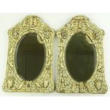 A pair of Antique Dieppe ivory wall mirrors, with applied relief carved bone heraldic lions,