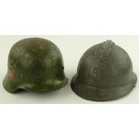 A Second World War Germany Army tin helmet, and a French tin helmet, (2).