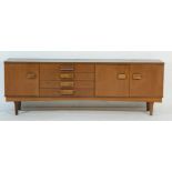 Retro teak dining suite, circa late 1960s, comprising long sideboard,