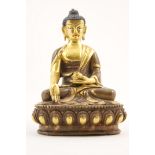 Tibetan gilt bronze Bhaishajyaguru (Medicine Buddha), 19th Century, seated in Dhyanasana,