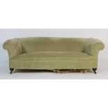 Victorian Chesterfield settee, upholstered in jade green fabric, with turned forelegs, pot castors,