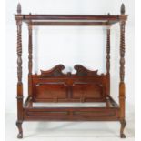 Carved mahogany four poster bed,