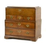 Queen Anne oak mule chest, circa 1710, having a lift up caddy top over three small drawers,