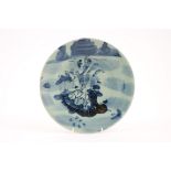 Swatow celadon porcelain dish, 19th Century, with stylised underglaze blue decoration,