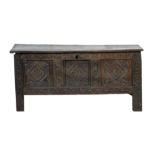 Oak joined coffer, in part late 17th Century, hinged plank top,