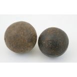 English 4lbs 14ozs cannonball, 8cm diameter; also a smaller cannonball weighing 4lbs 5ozs, 7.