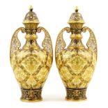 Pair of Derby Crown Porcelain lidded vases, circa 1880, of Etruscan shape with pierced domed covers,