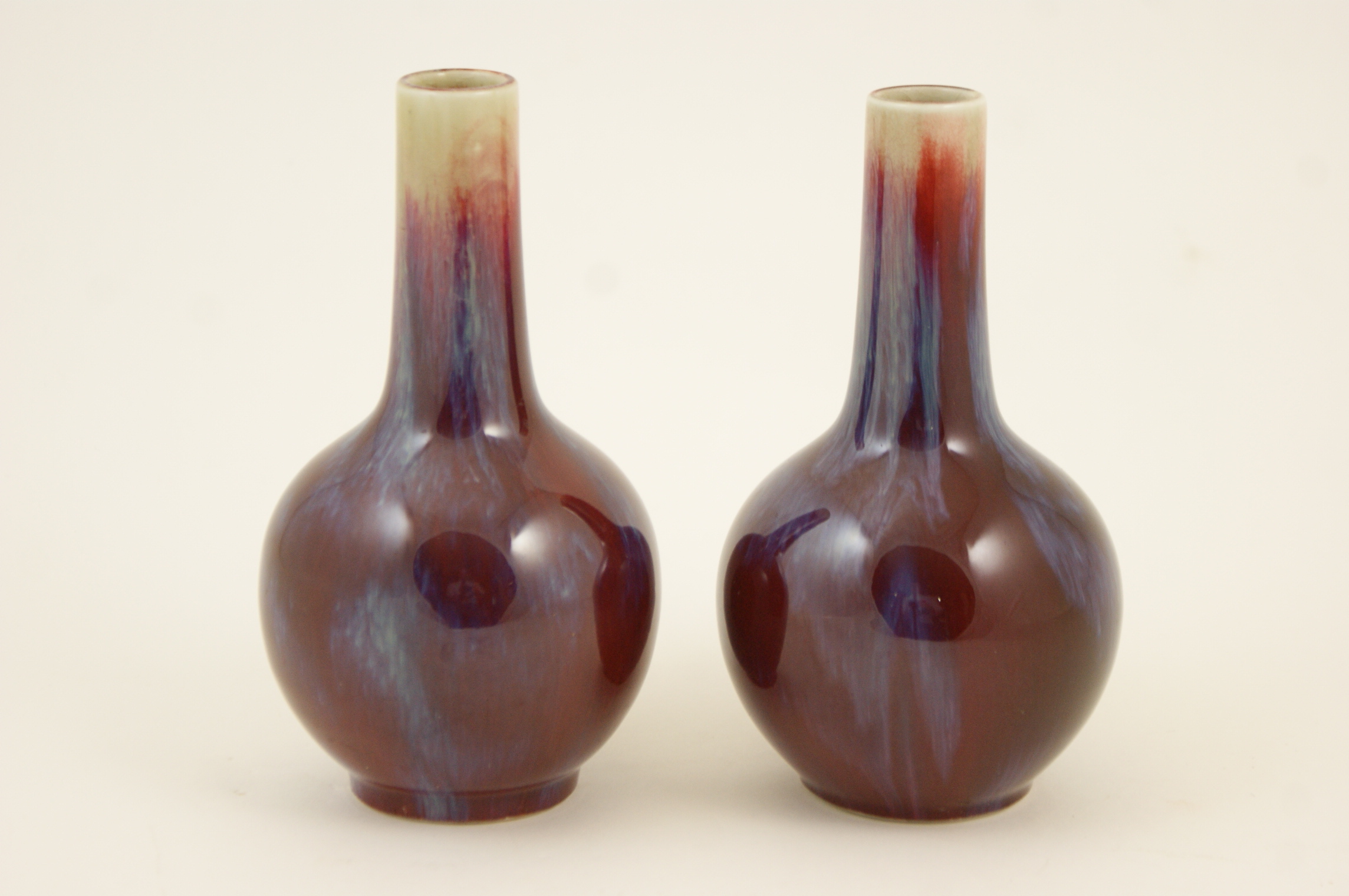 Pair of Chinese flambe bottle vases, late 19th or 20th Century,