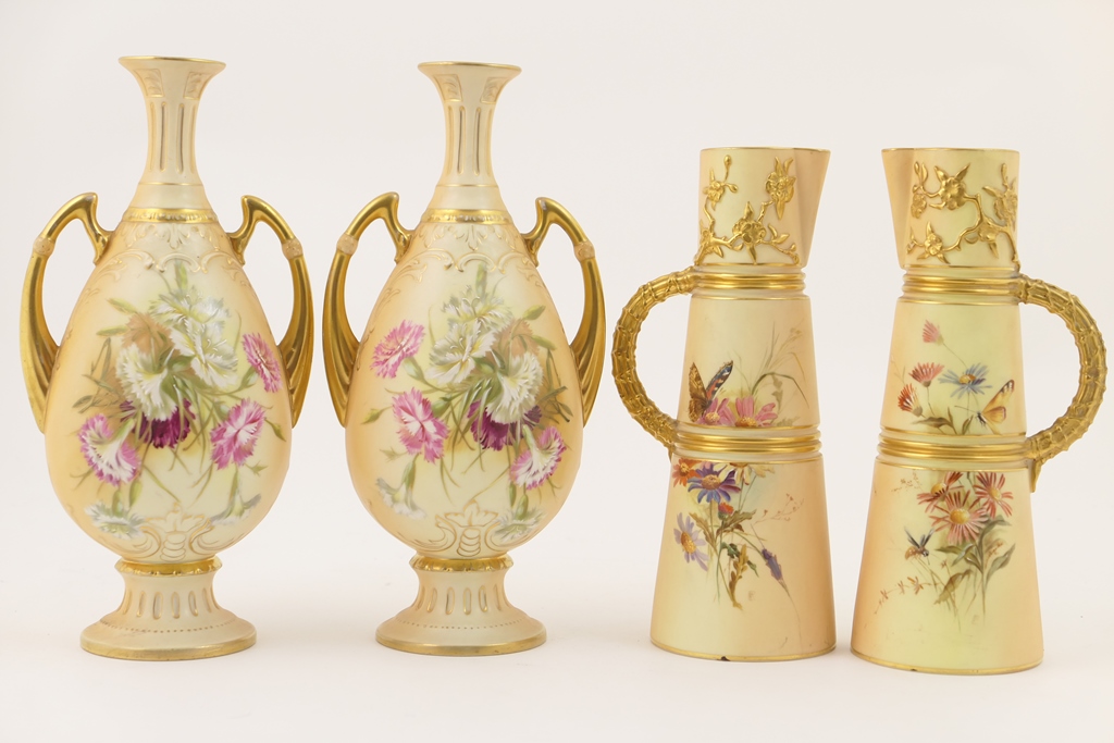 Pair of Royal Worcester peach ground jugs, circa 1896,