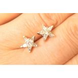 Pair of diamond star cluster earrings,