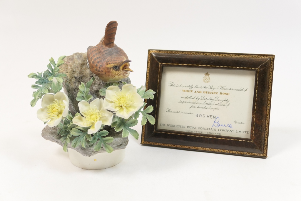 Royal Worcester model of a wren and burnet rose, circa 1964,