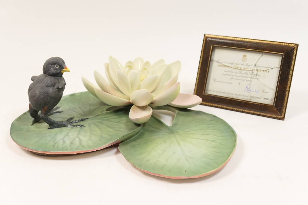 Royal Worcester model of a moorhen chick and water lily, circa 1964,