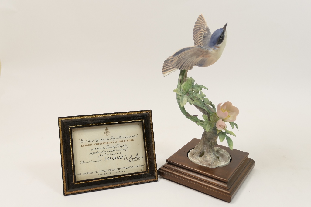 Royal Worcester model of a lesser whitethroat and wild rose, circa 1964,