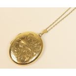 9ct gold picture locket, oval form with scrolled engraving, 40mm x 33mm,