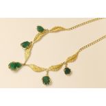 18ct yellow gold and rough cut emerald pendant necklace,