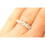 Diamond five stone ring, in 18ct white and yellow gold, graduated old brilliant cut stones,
