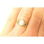 Opal and rose diamond ring, in 18ct yellow gold, centred with a cabochon opal, approx.