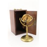 Victorian gyroscope by J B Dancere, Manchester, slightly worn lacquered finish,