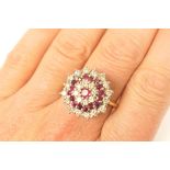 Ruby and diamond cluster ring,