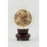 Chinese Republic internally decorated glass sphere, decorated with a busy riverside town scene,