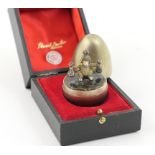 Stuart Devlin silver gilt surprise egg, London 1980, brushed satin finish,