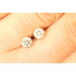 Pair of diamond ear studs, brilliant cut stones totalling approx.