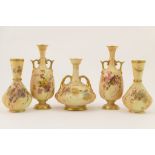 Pair of Royal Worcester peach ground twin handled vases, circa 1899,